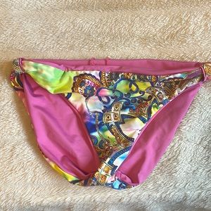 Swim bikini bottom size small reversible ladies.